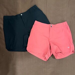 The American outdoorsman women’s shorts, two pair, black and coral.